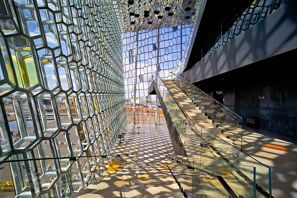 Exploring Harpa Opera House in Reykjavik Iceland on a sunny day Print