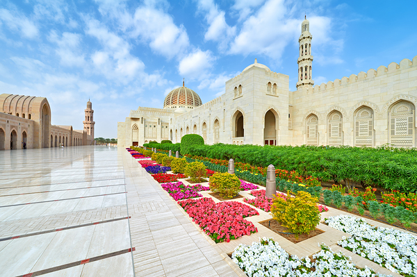 Visit Sultan Qaboos Grand Mosque in Muscat Oman during the day Print