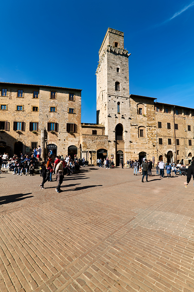 Visitors gather in San Gimignano at Piazza della Cisterna Print