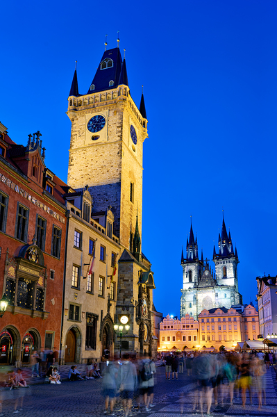 Prague Old Town Square at night featuring iconic illuminated bu by Marco Brivio