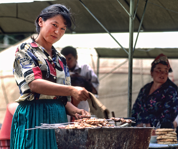 Street food vendors serve meat skewers in Samarkand Uzbekistan Print