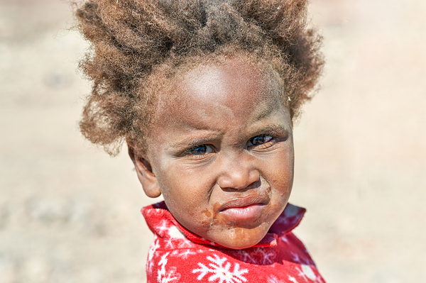 Children playing in Palmwag Kunene Region Damaraland Namibia Print