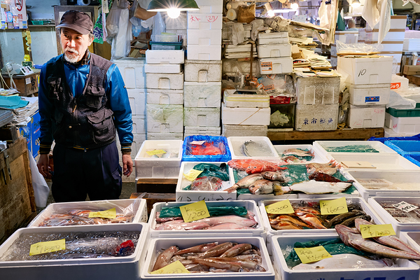 Fish market in Tokyo shows variety of seafood and local seller Print