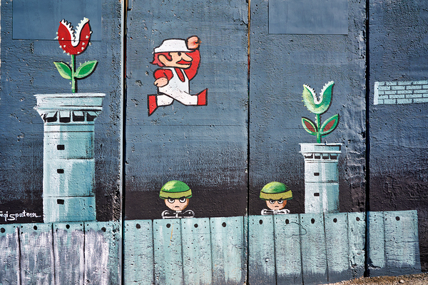 Art on the west bank separation wall in Bethlehem Jerusalem Print