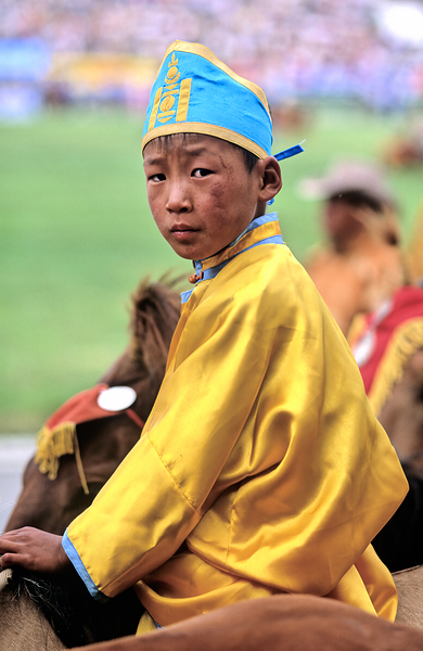 Young horse rider at Naadam festival in Ulaanbaatar Mongolia by Marco Brivio