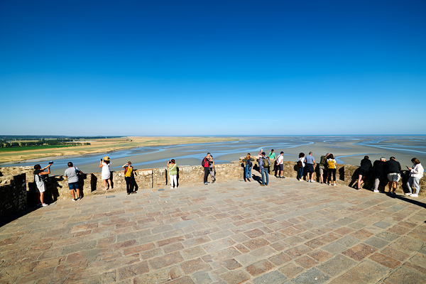 Aerial view of Mont Saint Michel in Normandy during low tide by Marco Brivio