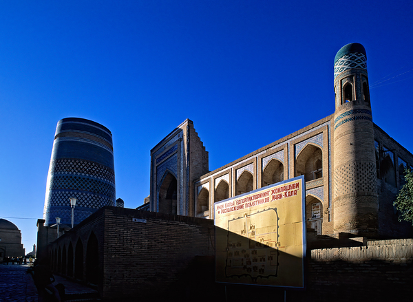 Khivas historic architecture against a blue sky Print