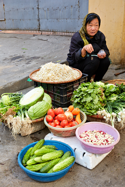 Woman sells fresh vegetables in Hanoi market Digital Download