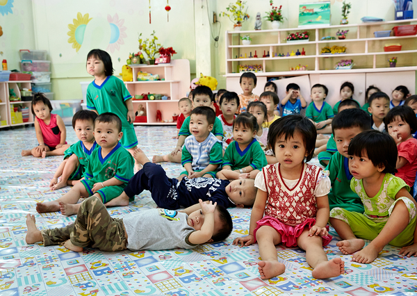 Children gather in classroom in Ho Chi Minh City during lesson Digital Download