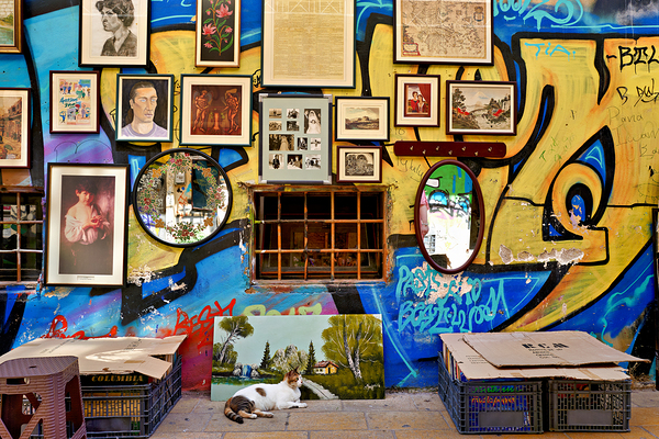 Flea market scene in Monastiraki Athens with colorful wall art Print