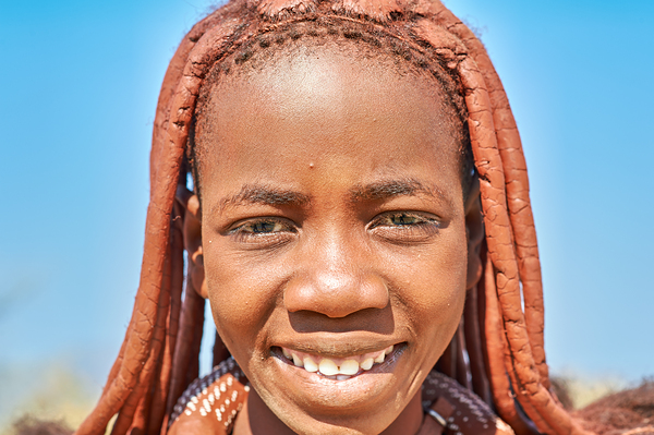 Portrait of Himba woman in Kunene region of Namibia by Marco Brivio