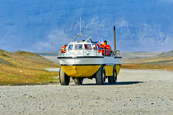 Exploring Jokulsarlon Glacier Lagoon with amphibian vehicle Print