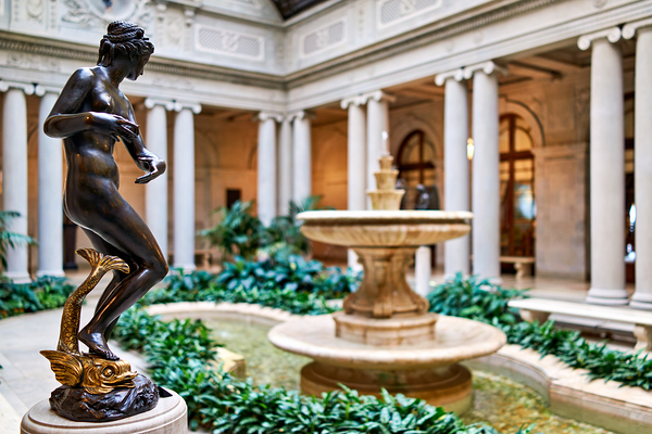 Sculpture near fountain in courtyard at Frick Collection in Manh by Marco Brivio