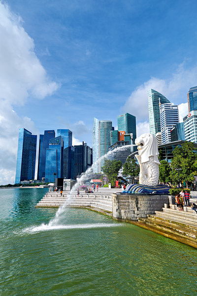 People walk near bridge in Singapore financial district by lush  Print