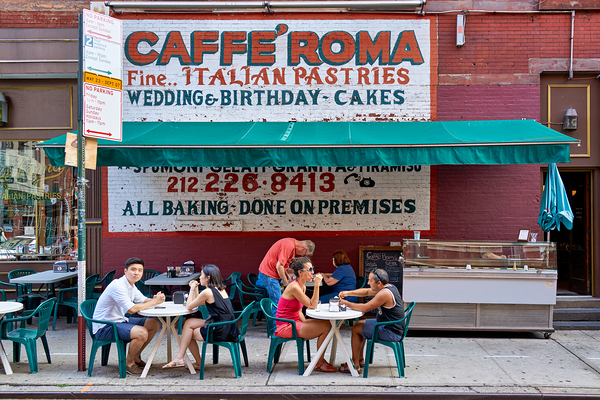 Visitors enjoy pastries at Caffe Roma in Little Italy New York Print
