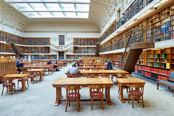 Students study in spacious library reading room at Mitchell Libr Print