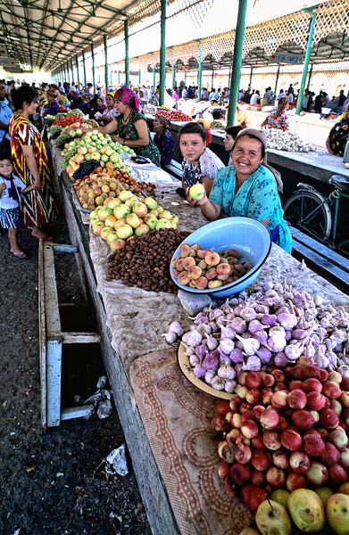 Market scene in Khiva Uzbekistan with fresh produce and people Print
