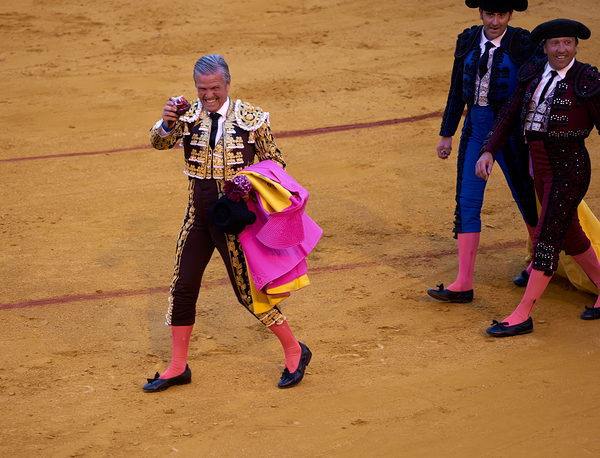 Bullfighters celebrate after event in Seville Arena by Marco Brivio