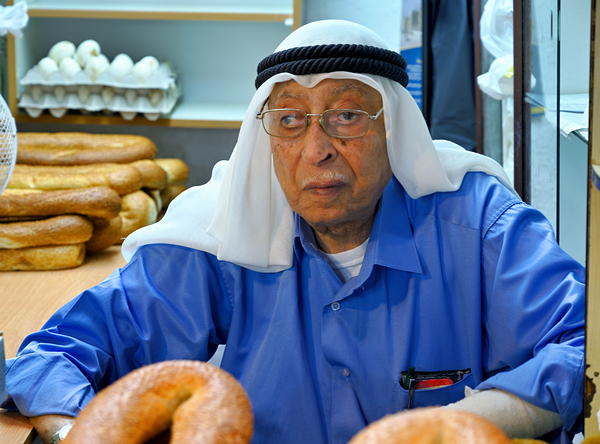 Baker working in the souq of the old city in Jerusalem Israel Print
