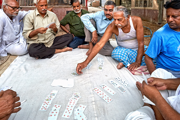 Men playing cards on the street in Bikaner Rajasthan during the Print
