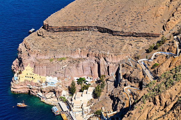 Amoudi Bay Santorini: boats buildings and cliff paths. by Marco Brivio
