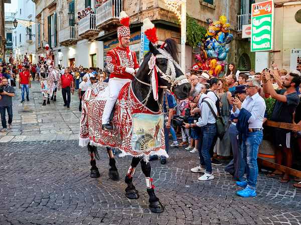 Apulia Puglia Italy. Ostuni. Festival of Saint Orontius. The cavalcata a procession of horses in the streets of the town Digital Download