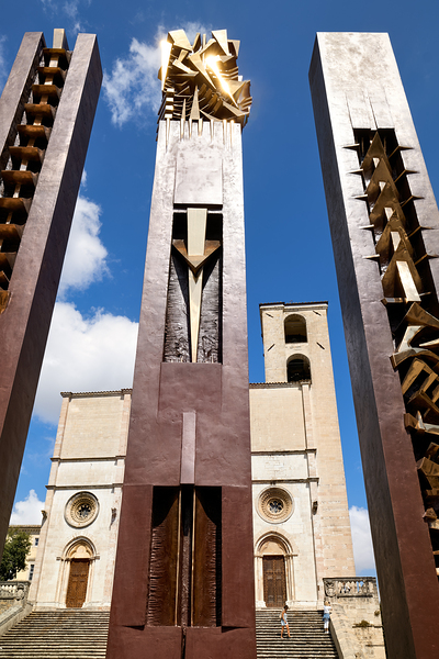 Todi Umbria Italy. Concattedrale della Santissima Annunziata. Cathedral. Piazza del Popolo. The statue Quattro Stele by Arnaldo Pomodoro Print