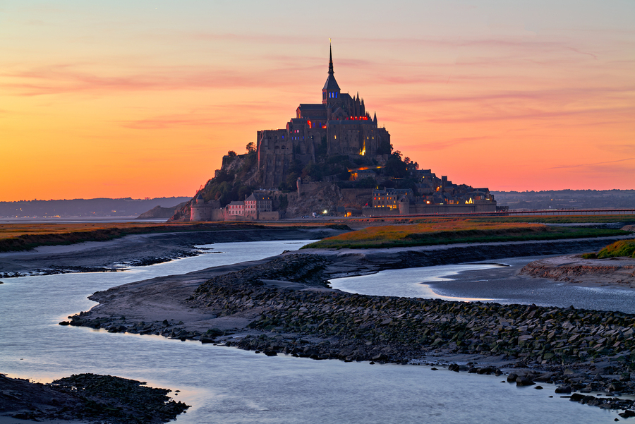 Mont Saint Michel in Normandy at dusk with river and landscape  Print