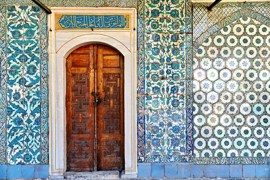 Exploring the tiled walls and wooden door at Topkapi Palace  Print
