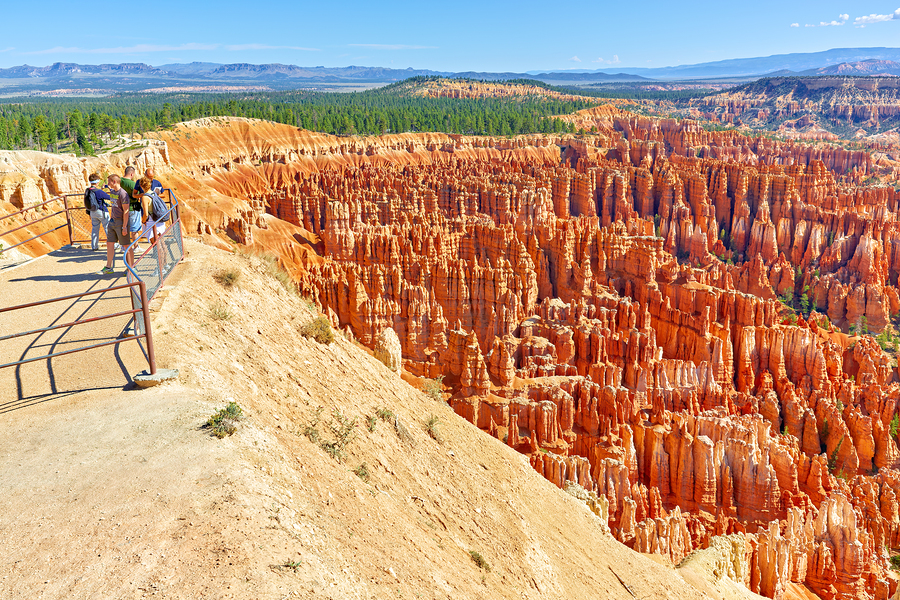 Visitors enjoy the view at Bryce Canyons Inspiration Point  Print
