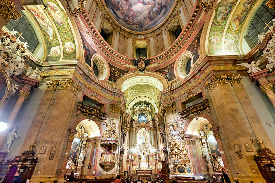 Grand Baroque church interior richly decorated with frescoes an  Print