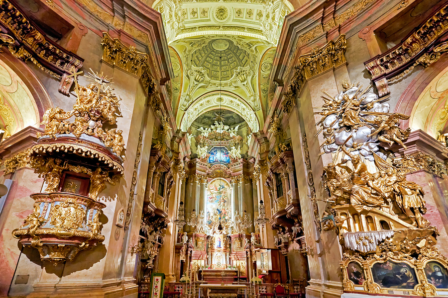 Stunning Baroque church interior rich with gold and religious a  Print