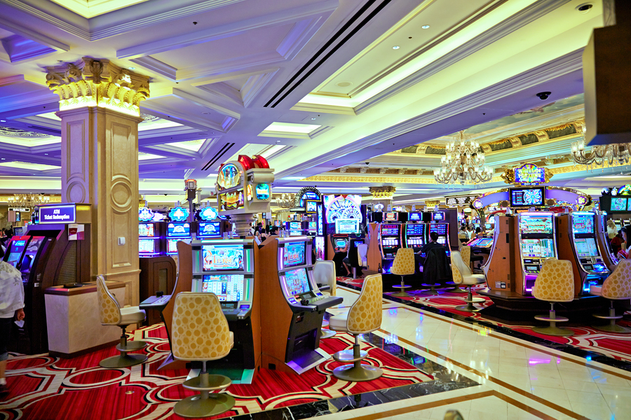 Slot machines in action at Venetian Hotel in Las Vegas  Print