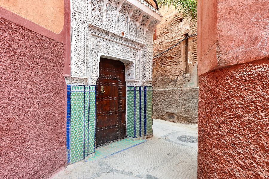 Narrow alleys in Marrakeshs Medina show traditional architectur  Print
