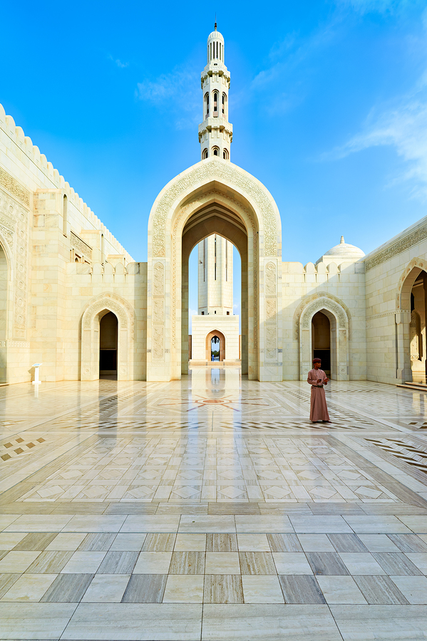 Visitors explore Sultan Qaboos Grand Mosque in Muscat  Print
