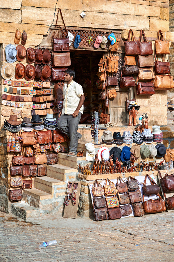 Selling leather bags in Jaisalmer from a shop  Print