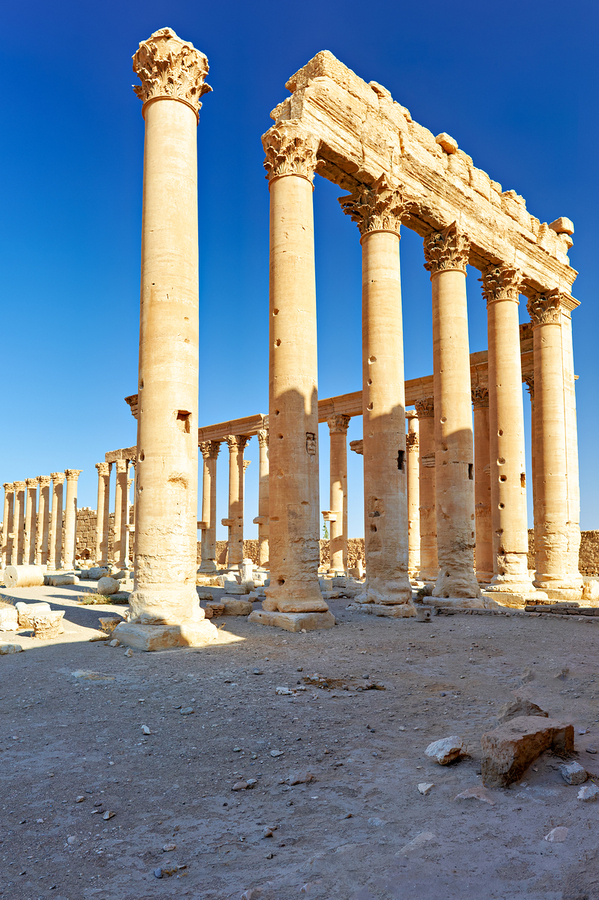 Exploring the ruins of the Temple of Bel in Palmyra Syria  Print