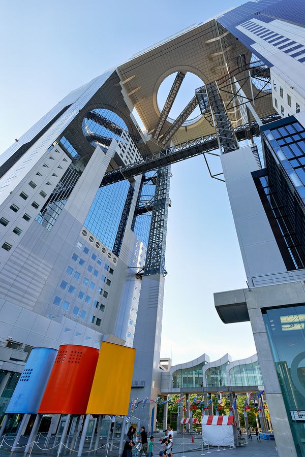 Osakas Umeda Sky Building shows modern architecture and busy ac  Print