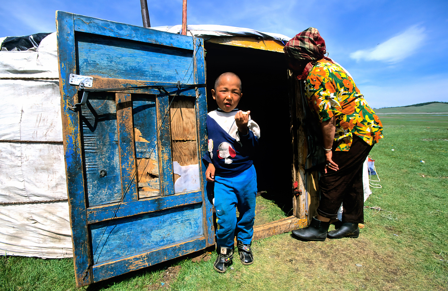Ger tent in Mongolia with child and elder outside  Print
