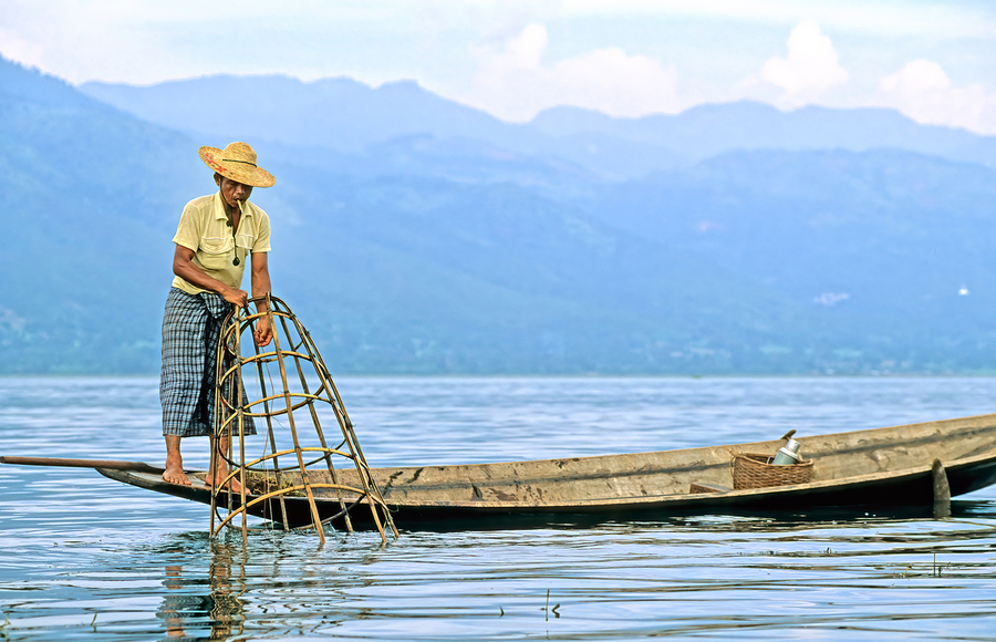 Traditional fishing on Inle Lake in Myanmar by local fisherman  Print
