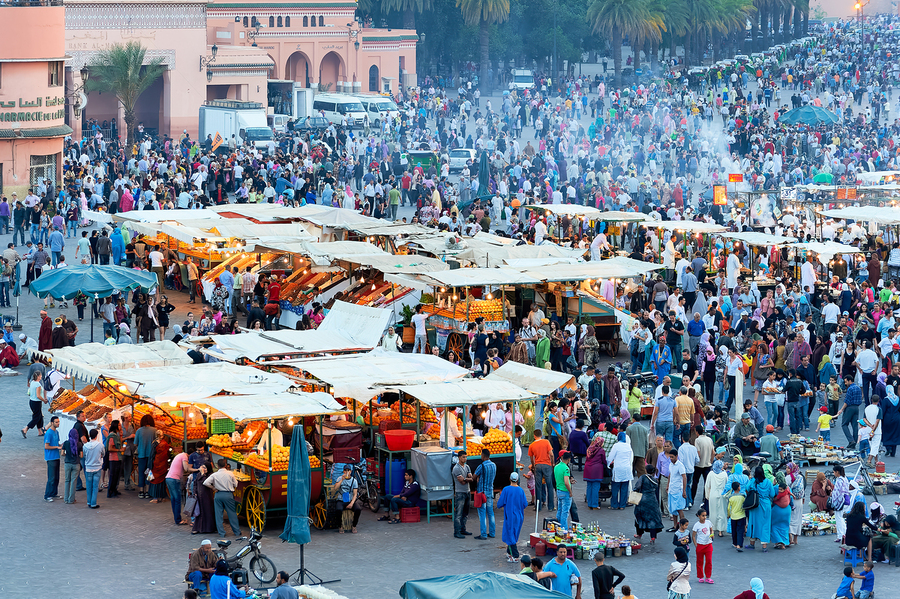 Sunset at Djema el Fna square in Marrakesh with lively crowds  Print