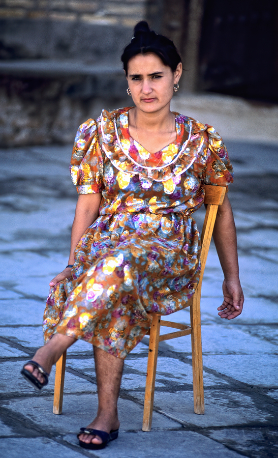 Woman sitting on a chair in Khiva Uzbekistan  Print