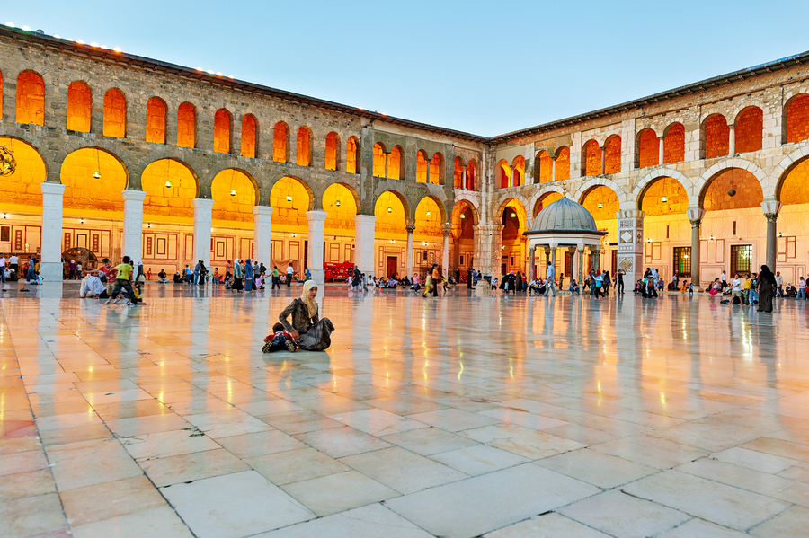 Visitors gather in the courtyard of Umayyad Mosque in Damascus  Print