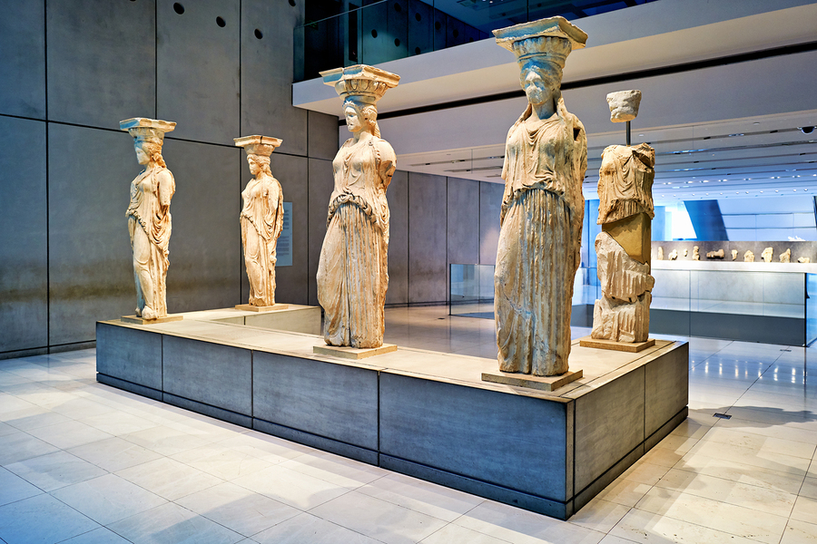 Exploring caryatids at Acropolis Museum in Athens Greece  Print