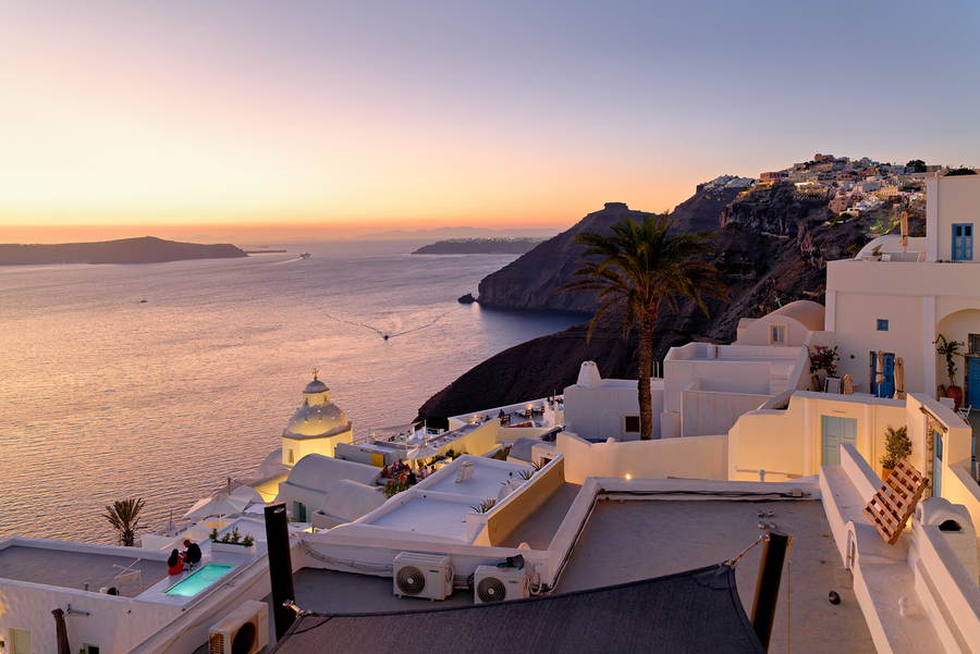 Scenic Santorini sunset white buildings overlooking the caldera  Print