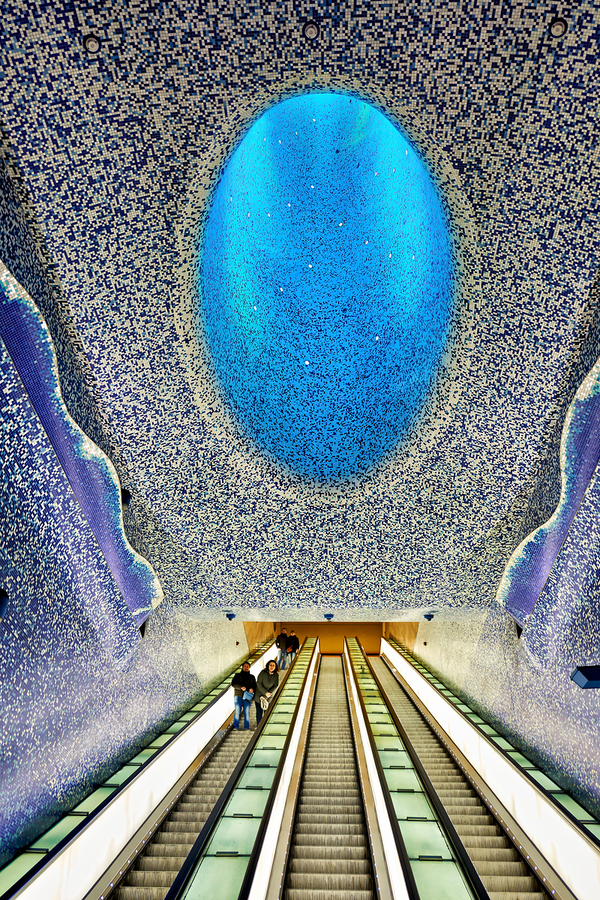 People travel down escalators at Toledo station in Naples Metro  Print