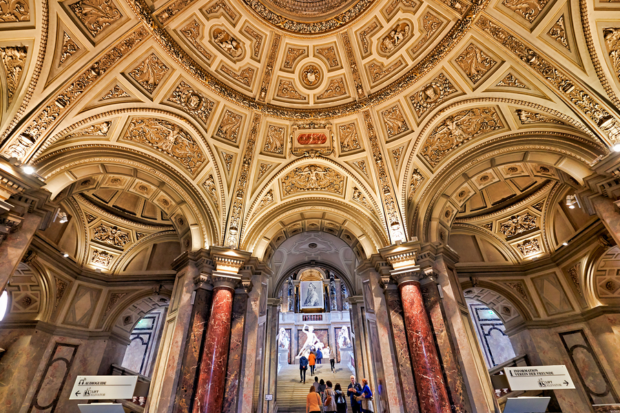 Grand ornate museum interior with decorative ceiling and column  Print