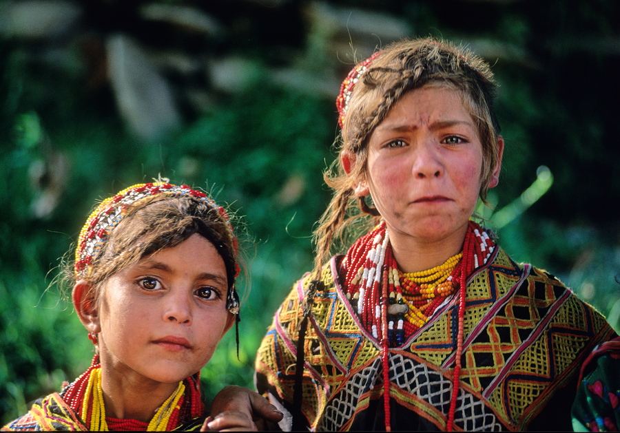 Children of Pakistan wear traditional clothing in the sunlight  Print