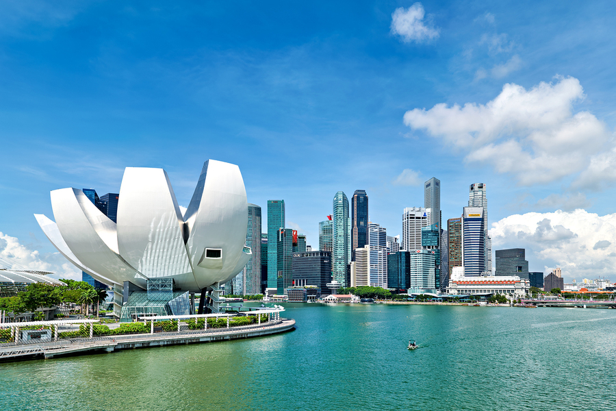 Visitors enjoy view of ArtScience Museum and city skyline in Sin  Print