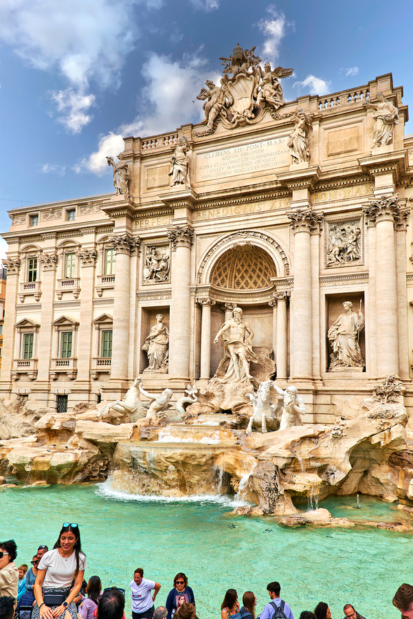 Tourists gather at Trevi Fountain in Rome during a sunny day  Print